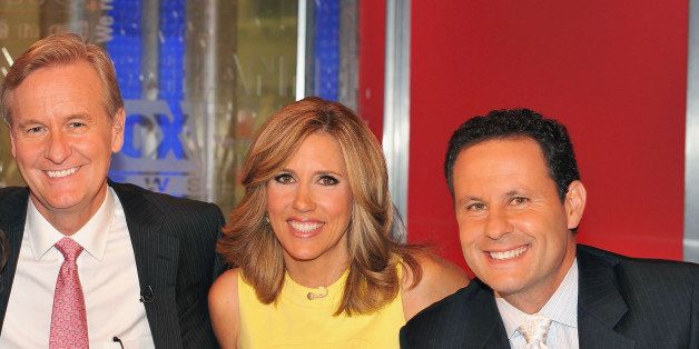 NEW YORK, NY - JUNE 29: (L-R) Singer/actress Selena Gomez and FOX & Friends hosts Steve Doocy, Alisyn Camerota and Brian Kilmeade pose for photo at 'FOX & Friends' at FOX Studios on June 29, 2011 in New York City. (Photo by Slaven Vlasic/Getty Images)
