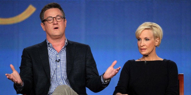 PASADENA, CA - JANUARY 07: (L-R) Host Joe Scarborough and co-host Mika Brzezinski speak onstage during the 'Morning Joe' pan