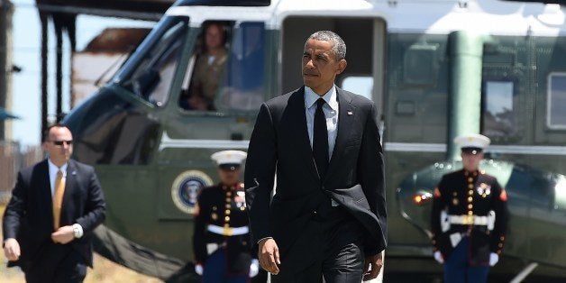 US President Barack Obama arrives at San Francisco International Airport in San Francisco, California, on July 23, 2014, to board Air Force One en route to Los Angeles. Obama is in California to attend fundrising events. AFP PHOTO/Jewel Samad (Photo credit should read JEWEL SAMAD/AFP/Getty Images)