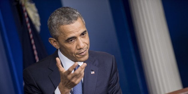 US President Barack Obama answers questions in the briefing room of the White House August 1, 2014 in Washington, DC. AFP PHOTO/Brendan SMIALOWSKI (Photo credit should read BRENDAN SMIALOWSKI/AFP/Getty Images)