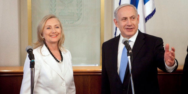 JERUSALEM, ISRAEL - JULY 16: Israeli Prime Minister Benjamin Netanyahu meets with U.S. Secretary of State Hillary Clinton on July 16, 2012 in Jerusalem, Israel. Clinton is in Israel to discuss diplomacy with Iran, Syria and Egypt in addition to peace talks regarding the Middle East. (Photo by ABIR SULTAN-Pool/Getty Images)