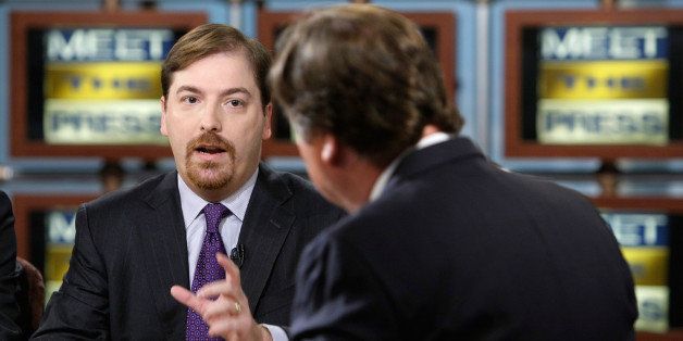 WASHINGTON - MARCH 23: NBC News Political Director Chuck Todd (L), speaks as moderator Tim Russert (R) looks on during a taping of 'Meet the Press' at the NBC studios March 23, 2008 in Washington, DC. Todd discussed the presidential race for the elections in November, 2008. (Photo by Alex Wong/Getty Images for Meet the Press)