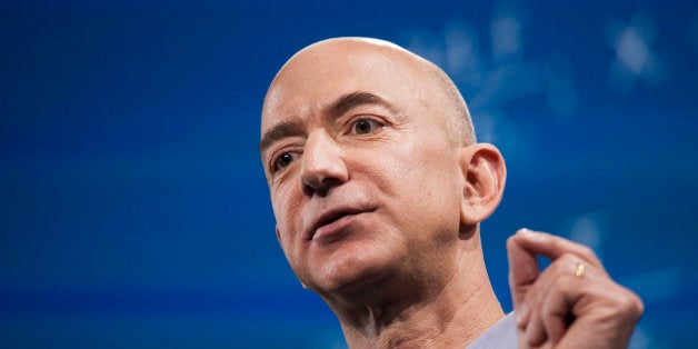 SEATTLE, WA - JUNE 18: Amazon.com founder and CEO Jeff Bezos presents the company's first smartphone, the Fire Phone, on June