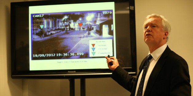 LONDON, ENGLAND - NOVEMBER 26: David Davies, a supporter of former Chief Whip Andrew Mitchell, shows video evidence to reporters on November 26, 2013 in London, England. One police officer is to be charged in connection with a disputed incident involving Mr Mitchell at the gates of Downing Street and five others are to face disciplinary proceedings. (Photo by Peter Macdiarmid/Getty Images)