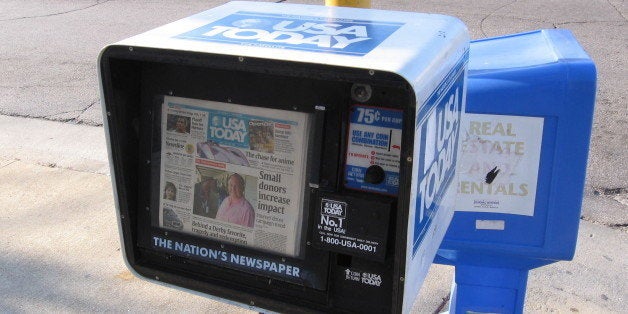 A photo of a USA Today newspaper vending box in Milwaukee.