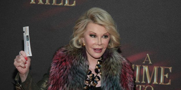 Comedian Joan Rivers attends the opening night of "A Time To Kill" on Broadway on Sunday, Oct. 20, 2013 in New York. (Photo by Andy Kropa/Invision/AP)