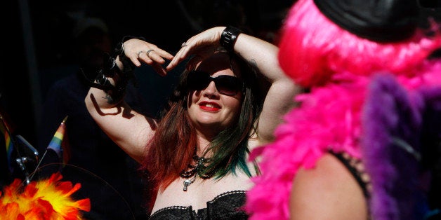 SAN FRANCISCO - JUNE 30: Rachel 'Hella Oakland', of Oakland, waits to hop on her motorcycle with the Queer Atheist Fire Fighter contingent before the 43rd annual San Francisco Lesbian, Gay, Bisexual, Transgender (LGBT) Pride Celebration & Parade June 30, 2013, in San Francisco, California. The annual S.F. Pride Parade occurred just days after same-sex marriages were reinstated in California following the recent Supreme Court rulings. (Photo by Sarah Rice/Getty Images) *(ed note - that's the only name she would give for her last name)