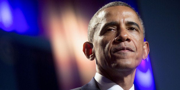 U.S. President Barack Obama pauses while speaking at the Democratic National Committee's (DNC) annual Women's Leadership Forum in Washington, D.C., U.S., on Friday, Sept. 19, 2014. Speaking at an event today at the White House, President Obama rolled out the 'It's On Us' campaign to encourage college students, especially men, to speak out against and prevent sexual assault on campuses. Photographer: Andrew Harrer/Bloomberg via Getty Images 