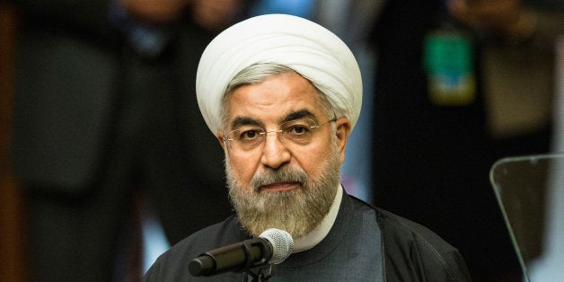 NEW YORK, NY - SEPTEMBER 23: Iranian President Hassan Rouhani speaks at the United Nations Climate Summit on September 23, 2014 in New York City. The summit, which is meeting one day before the UN General Assembly begins, is bringing together world leaders, scientists and activists looking to curb climate change. (Photo by Andrew Burton/Getty Images)