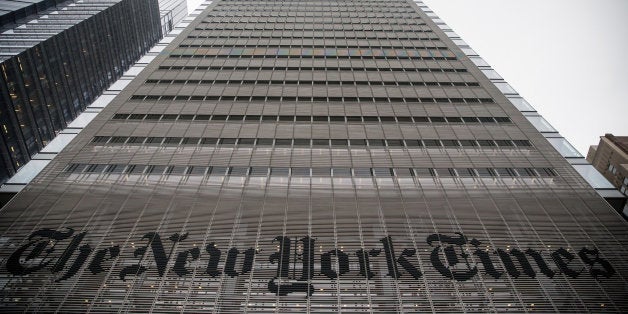 NEW YORK, NY - OCTOBER 01: The New York Times building is seen on October 1, 2014 in New York City. The Times announced plans to cut approximately 100 jobs from the newsroom today, with the company announcing it will start with buy-out packages before moving to layoffs. (Photo by Andrew Burton/Getty Images)