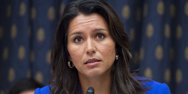 UNITED STATES - OCTOBER 1: Rep. Tulsi Gabbard, D-Hawaii, attends a House Foreign Affairs Subcommittee on the Western Hemisphere hearing in Rayburn Building, October 1, 2014, on Marine Sgt. Andrew Tahmooressi who is imprisoned in Mexico. Tahmooressi, who suffers from PTSD, has been held in Mexico since being arrested in March for carrying guns across the border. (Photo By Tom Williams/CQ Roll Call)