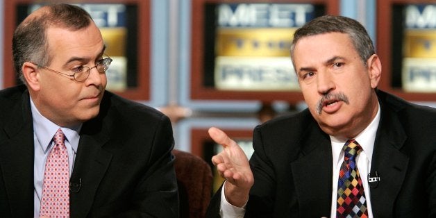 WASHINGTON - DECEMBER 17: (AFP OUT) New York Times columnists Tom Friedman (R) and David Brooks (L) participate in a discussion during a taping of 'Meet the Press' at the NBC studios December 17, 2006 in Washington, DC. Friedman and Brooks spoke on various topics including the war in Iraq and the 2008 Presidential election. (Photo by Alex Wong/Getty Images for Meet the Press)