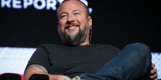 IMAGE DISTRIBUTED FOR PROMAXBDA - Shane Smith, founder and CEO of VICE, smiles in an interview with David Carr, The New York Times culture reporter, and Tom Freston, principal of Firefly3, not pictured, at the PromaxBDA #WTFuture Conference, Tuesday, June 10, 2014, in New York. (John Minchillo/AP Images for PromaxBDA)