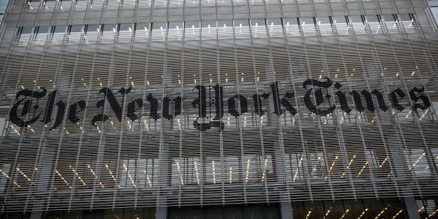 NEW YORK, NY - OCTOBER 01: The New York Times building is seen on October 1, 2014 in New York City. The Times announced plans to cut approximately 100 jobs from the newsroom today, with the company announcing it will start with buy-out packages before moving to layoffs. (Photo by Andrew Burton/Getty Images)