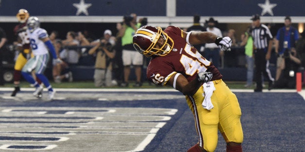 DALLAS - OCTOBER 27: Washington Redskins running back Alfred Morris (46)celebrates his third quarter touchdown
during the ga
