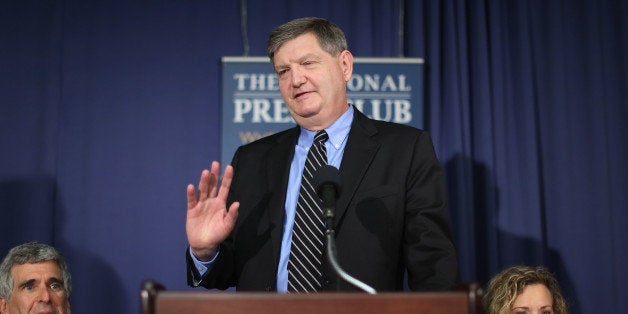 WASHINGTON, DC - AUGUST 14: New York Times reporter James Risen (C), RootsAction.org co-founder Norman Solomon (L) and natio
