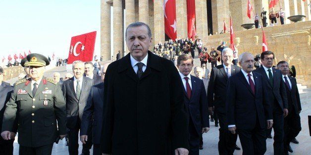 Turkish President Tayyip Erdogan(C), Prime Minister Ahmet Davutoglu (2nd R), Chief of Staff of the Armed Forces General Necdet Ozel (L) and the leader of the Republican People's Party Kemal Kilicdaroglu (R) attend a ceremony at the mausoleum of Mustafa Kemal Ataturk, Turkish Republics founder, marking the anniversary of his death, on November 10, 2014 in Ankara. AFP PHOTO/ADEM ALTAN (Photo credit should read ADEM ALTAN/AFP/Getty Images)