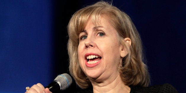 Nancy Gibbs, the managing editor of Time, moderates the panel discussion "Vital Resources: Doing More with Less" at the Clinton Global Initiative, Wednesday, Sept. 25, 2013, in New York. (AP Photo/Mark Lennihan)