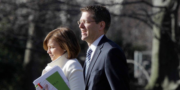 White House Press Secretary Jay Carney, who starts his new job today, walks with Deputy Chief of Staff Alyssa Mastromonaco on