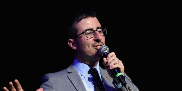 NEW YORK, NY - NOVEMBER 05: Comedian John Oliver performs onstage at 2014 Stand Up For Heroes at Madison Square Garden at Madison Square Garden on November 5, 2014 in New York City. (Photo by Andrew H. Walker/Getty Images)