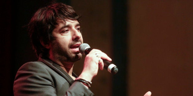 PORTLAND, OR - APRIL 24: Jian Ghomeshi records a live show at Aladdin Theater on April 24, 2014 in Portland, Oregon. (Photo by Natalie Behring/Getty Images)