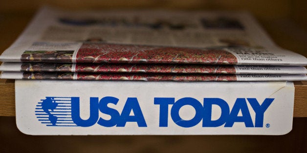 Copies of the USA Today newspaper sit on display for sale at a newsstand in Princeton, Illinois, U.S., on Tuesday, Aug. 5, 20