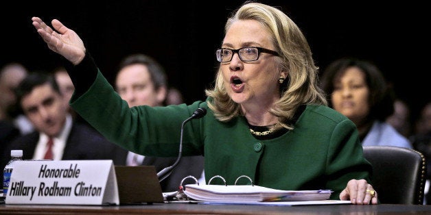 FILE - This Jan. 23, 2013, file photo shows Secretary of State Hillary Rodham as she testifies on Capitol Hill in Washington before the Senate Foreign Relations Committee hearing on the deadly attack on the U.S. diplomatic mission in Benghazi, Libya. The testimony of nine military officers severely undermines claims by Republican lawmakers that a âstand-down orderâ held back military assets who could have saved the U.S. ambassador and three other Americans killed in the attack. (AP Photo/Pablo Martinez Monsivais, File)