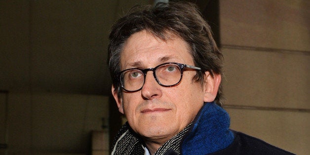 The editor of Britain's Guardian newspaper, Alan Rusbridger, arrives at Portcullis House in London on December 3, 2013, to ap