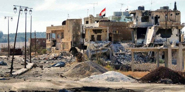 DARAA, SYRIA - OCTOBER 31: A wiev of the damaged houses in the southern Syrian city of Daraa on October 31, 2013. Free Syrian Army (FSA) fighters who have taken control of the large part of Daraa city, reportedly move towards the inner parts of the country. (Photo by Stringer/Anadolu Agency/Getty Images)