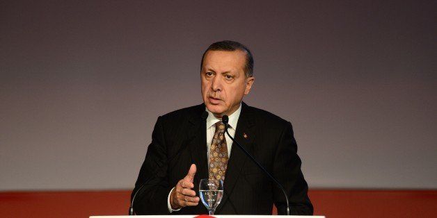 ANKARA, TURKEY - DECEMBER 10: Turkey's President Recep Tayyip Erdogan gives a speech during the opening of the International Petroleum and Natural Gas Strategies Symposium that will be held due to 60th anniversary of the foundation of the Turkish Petroleum Corporation (TPAO) at Ataturk Culture Center in Ankara, Turkey on December 10, 2014. (Photo by Dilek Mermer/Anadolu Agency/Getty Images)