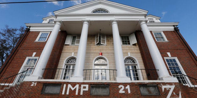 The Phi Kappa Psi fraternity house at the University of Virginia in Charlottesville, Va., Monday, Nov. 24, 2014. A Rolling Stone article last week alleged a gang rape at the house which has since suspended operations. (AP Photo/Steve Helber)