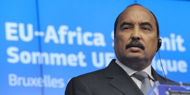 African Union President and Mauritania President Mohamed Ould Abdel Aziz talks during a joint press alongside the African Uni