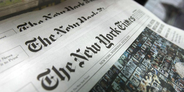 NEW YORK - JULY 23: Copies of the New York Times sit for sale in a rack July 23, 2008 in New York City. The New York broadsheet announced it posted an 82 percent decline in second quarter profits as compared to last year. It also announced it would raise its newsstand price 25 cents to a $1.50. (Photo by Mario Tama/Getty Images)