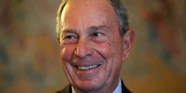 FILE - In this Tuesday, Sept. 16, 2014 file photo, former New York Mayor Michael Bloomberg smiles prior to be conferred with the Chevalier de la Legion d'Honneur by France's Foreign minister Laurent Fabius, at the Quai d'Orsay, in Paris. Michael Bloomberg is a knight _ but he wonât be Sir Mike. Britain's Queen Elizabeth II has bestowed an honorary knighthood on the billionaire businessman and former New York mayor. The British government said Monday, Oct. 6, 2014, that Bloomberg was made "an Honorary Knight of the Most Excellent Order of the British Empire" in recognition of his "prodigious entrepreneurial and philanthropic endeavors" and his work to strengthen trans-Atlantic ties. (AP Photo/Thibault Camus, File)