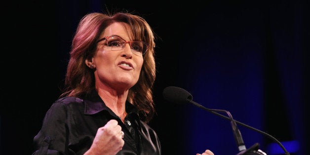 DES MOINES, IA - JANUARY 24: Former Alaska Governor Sarah Palin speaks to guests at the Iowa Freedom Summit on January 24, 2015 in Des Moines, Iowa. The summit is hosting a group of potential 2016 Republican presidential candidates to discuss core conservative principles ahead of the January 2016 Iowa Caucuses. (Photo by Scott Olson/Getty Images)