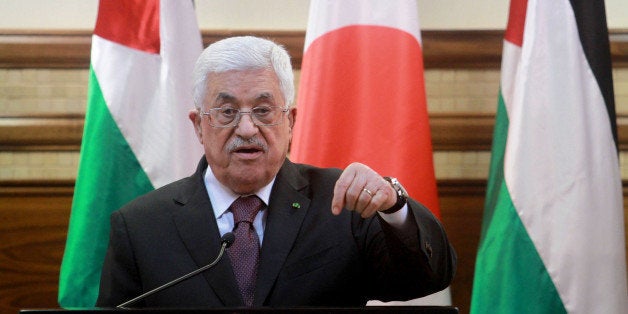 RAMALLAH, WEST BANK - JANUARY 20: Palestinian President Mahmoud Abbas delivers a speech during a joint press conference with Japanese Prime Minister Shinzo Abe in Ramallah, West Bank on January 20, 2015. (Photo by Issam Rimawi/Anadolu Agency/Getty Images)