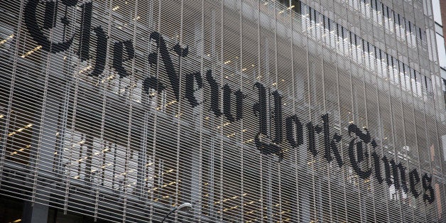 NEW YORK, NY - OCTOBER 01: The New York Times building is seen on October 1, 2014 in New York City. The Times announced plans to cut approximately 100 jobs from the newsroom today, with the company announcing it will start with buy-out packages before moving to layoffs. (Photo by Andrew Burton/Getty Images)