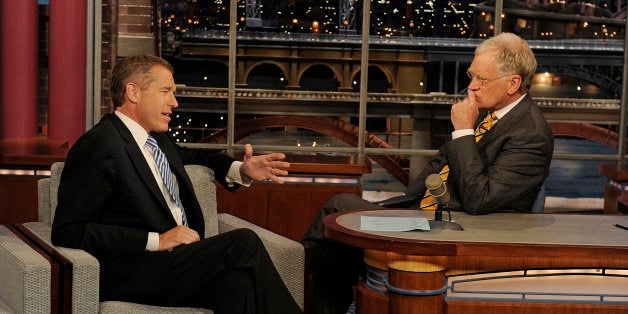 NEW YORK - MAY 2: Brian Williams and David Letterman talk about the killing of Osama Bin Laden on the LATE SHOW with DAVID LETTERMAN, Monday, May 2, 2011 on the CBS Television Network (Photo by Jeffrey R. Staab/CBS via Getty Images)