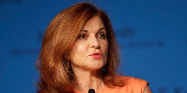 New York Times columnist Maureen Dowd asks a question to Robert Redford during a forum at the John F. Kennedy Library and Museum, Monday, Sept. 15, 2014, in Boston. Redford discussed issues on his career that has included acting, film direction, producing, environmental issues and civil rights. (AP Photo/Steven Senne)