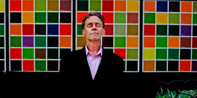 FILE - In this Aug. 11, 2008, file photo, David Carr, culture reporter and media columnist for The New York Times poses for a photograph on Eighth Avenue, in New York. Carr collapsed at the office and died in a hospital Thursday, Feb. 12, 2015. He was 58. Carr wrote the Media Equation column for the Times, focusing on issues of media in relation to business and culture. (AP Photo/Stephen Chernin, File)