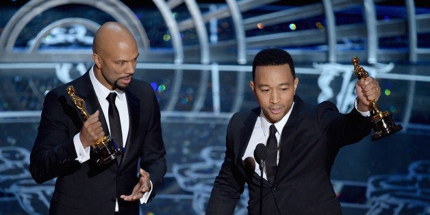 HOLLYWOOD, CA - FEBRUARY 22: Lonnie Lynn aka Common and John Stephens aka John Legend accept the Best Original Song Award fo