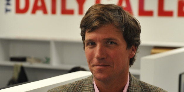 WASHINGTON, DC - JANUARY 7:Tucker Carlson, a conservative pundit, at the office of the new website, the Daily Caller, on January 6, 2010, in Washington, DC. The site, at which Carlson is the editor-in-cheif, has been branded as a 'conservative Huffington Post.' (Photo by Jahi Chikwendiu/The Washington Post via Getty Images)