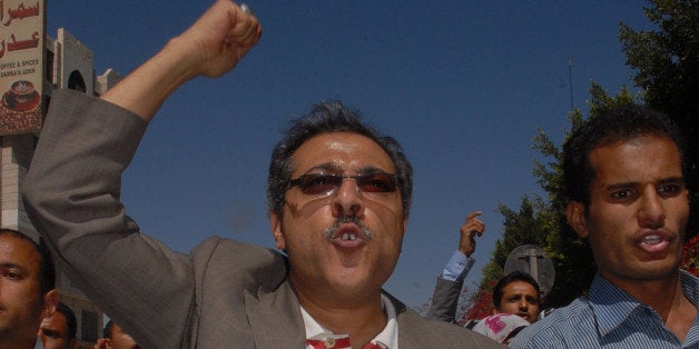 Yemeni opposition journalist Abdel Karim al-Khaiwani joins a protest calling for the ouster of Yemen's President Ali Abdullah Saleh in the capital Sanaa on January 29, 2011. Khaiwani, the editor-in-cheif of the Yemeni Al-Shoura weekly newspaper was jailed but later pardoned by the president in 2005. AFP PHOTO/GAMAL NOMAN (Photo credit should read GAMAL NOMAN/AFP/Getty Images)