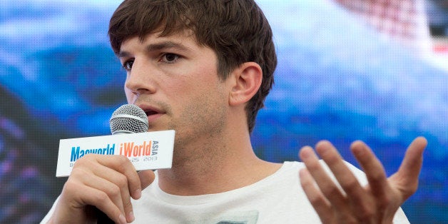 In this Sunday, Aug 25, 2013 photo, American actor Ashton Kutcher, who portrays Apple's Steve Jobs in the film "Jobs," speaks during an event hosted by the Macworld iWorld expo in Beijing. (AP Photo/Andy Wong)