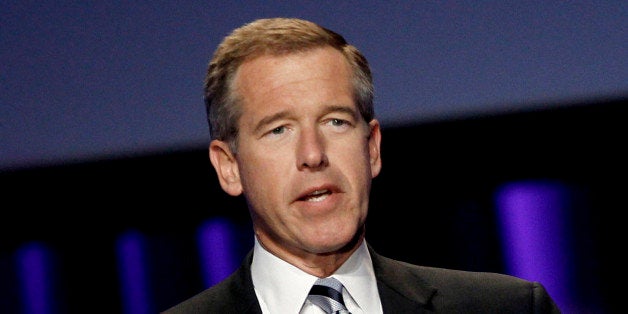 FILE - In this Oct. 26, 2010 file photo, Brian Williams, anchor and managing editor of "NBC Nightly News," speaks at the Women's Conference in Long Beach, Calif. NBC News erroneously reported the capture of two suspects and killing of another in the attack on a French newspaper office and has been forced to issue a correction. The false report came on NBC's flagship "Nightly News" Wednesday, Jan. 7, 2015, and was dialed back over the next few hours. Williams, was to explain the error to viewers on Thursday's broadcast. (AP Photo/Matt Sayles, File)