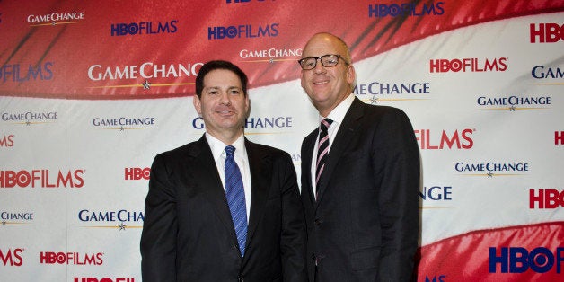 WASHINGTON, DC - MARCH 08: Mark Halperin and John Heilemann pose on the red carpet during the 'Game Change' premiere at The Newseum on March 8, 2012 in Washington, DC. (Photo by Kris Connor/Getty Images)