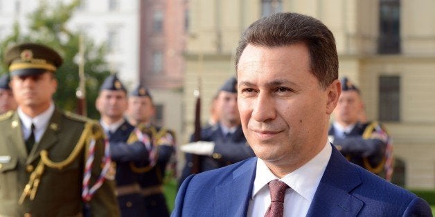 Macedonian Prime Minister Nikola Gruevski reviews a guard of honour during a welcoming ceremony a meeting with his Czech coun