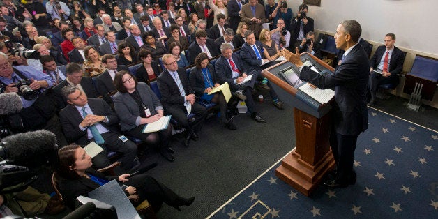 President Barack Obama speaks during a news conference in the Brady Press Briefing Room of the White House in Washington, Friday, Dec. 19, 2014. The president claimed an array of successes in 2014, citing lower unemployment, a rising number of Americans covered by health insurance, and an historic diplomatic opening with Cuba. He also touts his own executive action and a Chinese agreement to combat global warming. (AP Photo/Pablo Martinez Monsivais )