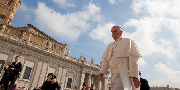 Pope Francis arrives for his weekly general audience in St. Peter's Square at the Vatican, Wednesday, April 29, 2015. (AP Pho