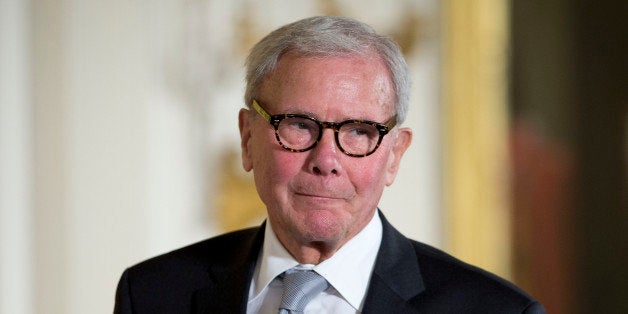 Journalist Tom Brokaw, is introduced before being awarded the Presidential Medal of Freedom, Monday, Nov. 24, 2014, during a